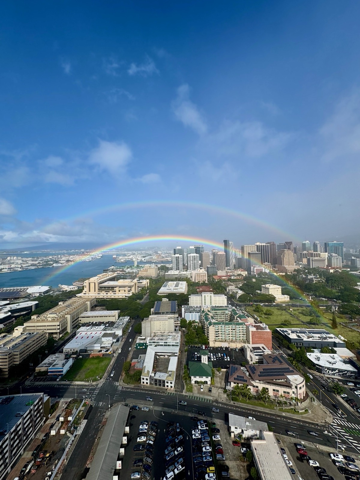 Double rainbow arching over Honolulu